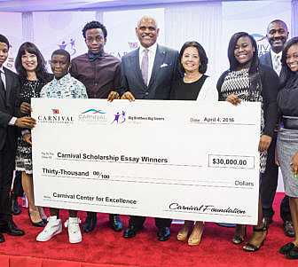 Linda Coll of Carnival Foundation (left) joins Arnold Donald of Carnival Corporation and Lydia Muniz of Big Brothers Big Sisters of Miami with the scholarship winners.