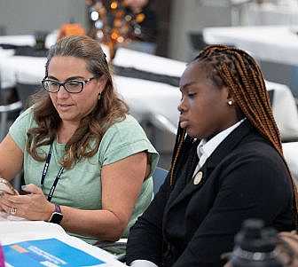 Students and mentors playing Kahoot.