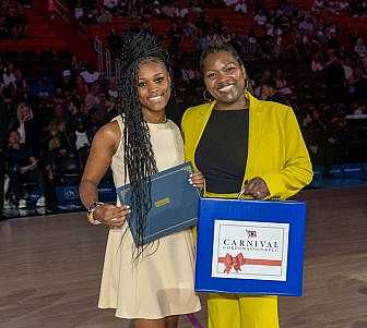 Arniesha Foster and her Carnival mentor Maria Rodriguez.