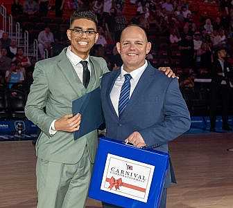 Michael Nazario and his Carnival mentor Daniel Fernandez.