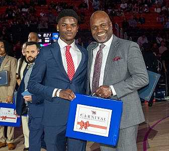 Adrian Ville and his Carnival mentor Calvin Ashley.