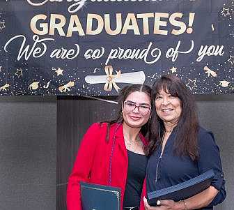 Linda Coll and graduating senior.