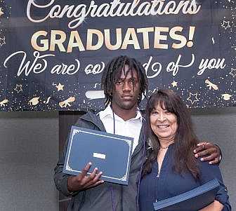Linda Coll and graduating senior.