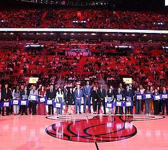 The Carnival Scholarship & Mentoring Program Scholarship winners at the MiamI HEAT game.